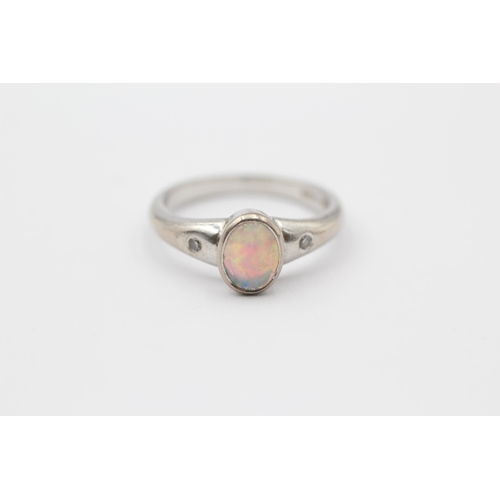 166 - 18ct White Gold White Opal Single Stone Ring With Diamond Set Shoulders (5.2g) Size  P