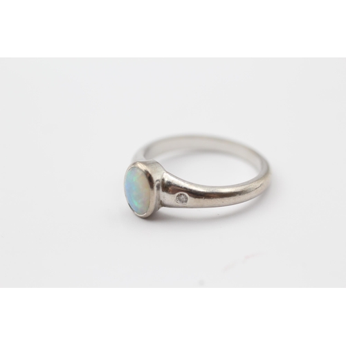 166 - 18ct White Gold White Opal Single Stone Ring With Diamond Set Shoulders (5.2g) Size  P