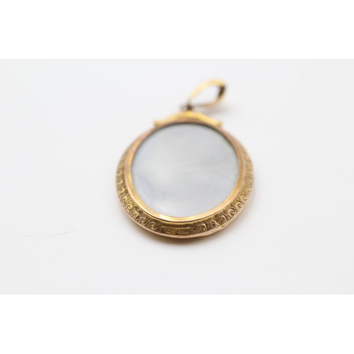 167 - 9ct Gold Antique Oval Double Locket Pendant (7.5g)