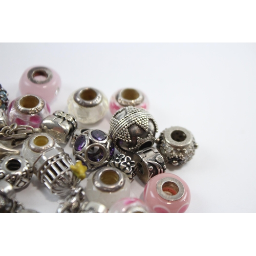 181 - A Collection Of Silver Branded Charms