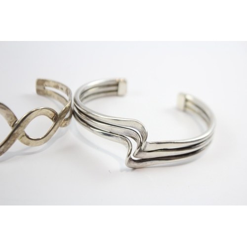 187 - A Collection Of Silver Bangles