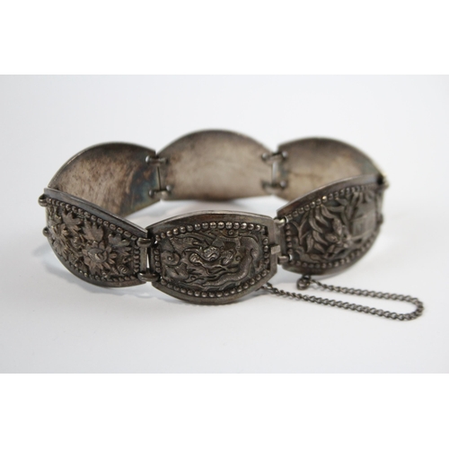 204 - Silver Asian Bracelet With Oriental Emblems