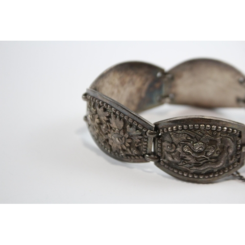 204 - Silver Asian Bracelet With Oriental Emblems