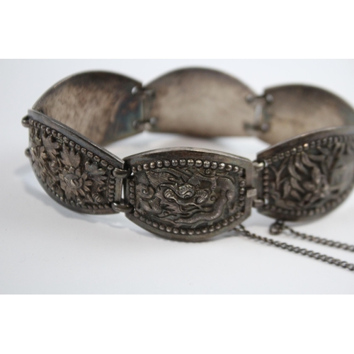 204 - Silver Asian Bracelet With Oriental Emblems