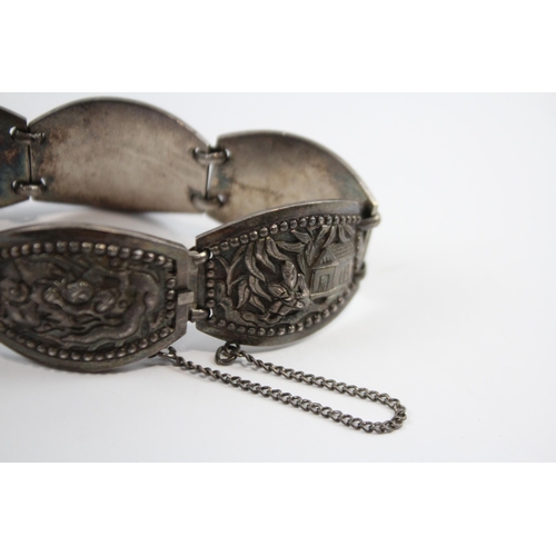 204 - Silver Asian Bracelet With Oriental Emblems