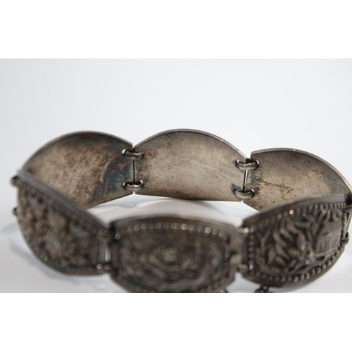 204 - Silver Asian Bracelet With Oriental Emblems