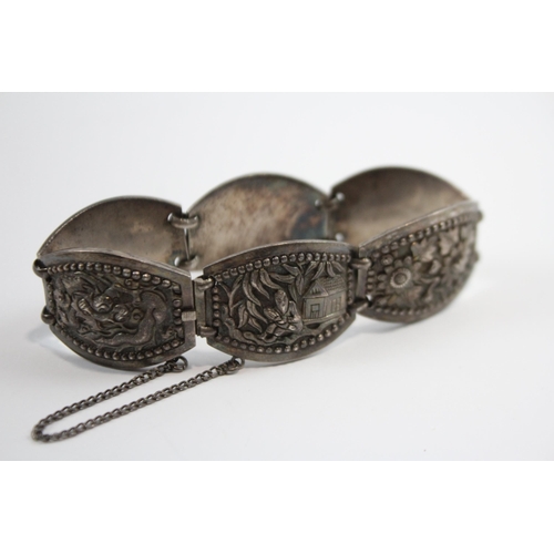 204 - Silver Asian Bracelet With Oriental Emblems