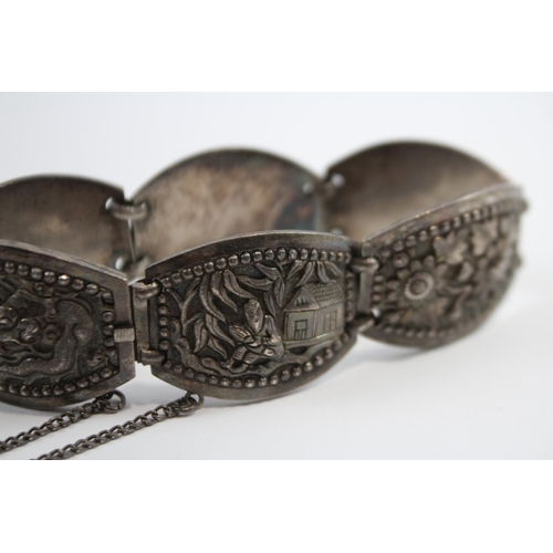 204 - Silver Asian Bracelet With Oriental Emblems