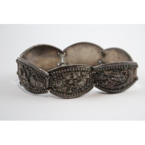 204 - Silver Asian Bracelet With Oriental Emblems