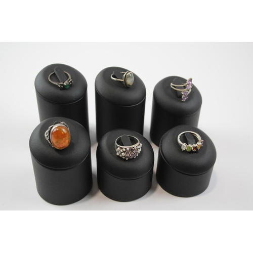 222 - A Collection Of Silver Gemstone Rings Including Amber