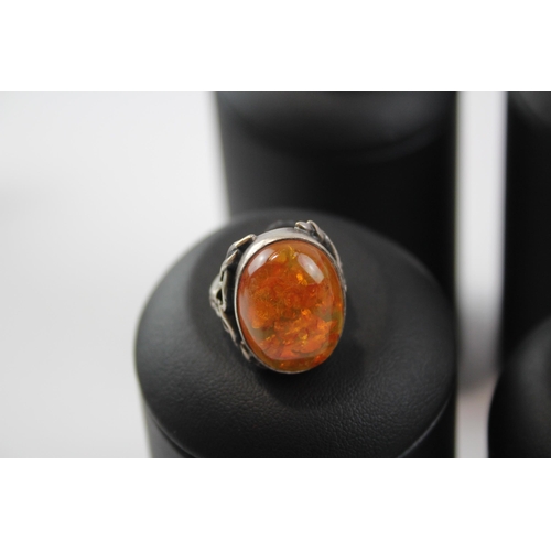 222 - A Collection Of Silver Gemstone Rings Including Amber