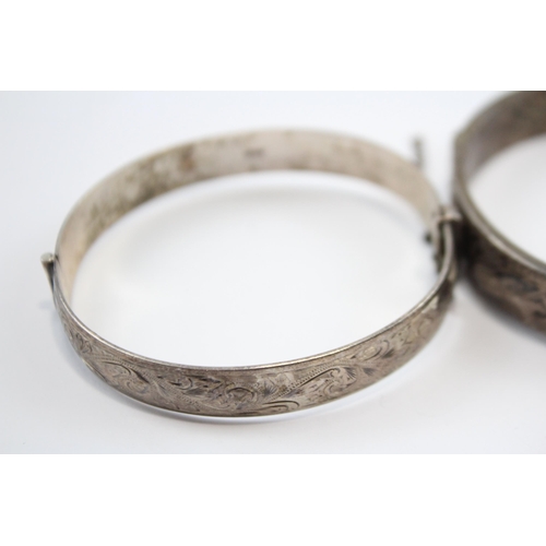 237 - A Collection Of Silver Bangles With Engraved Designs