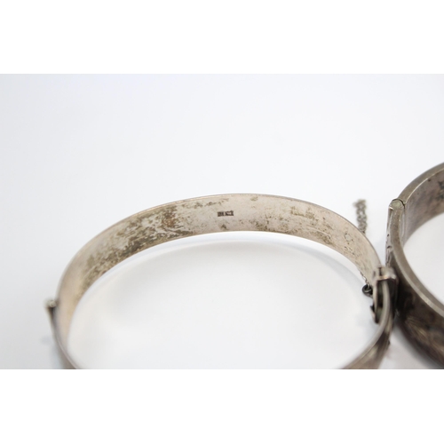 237 - A Collection Of Silver Bangles With Engraved Designs