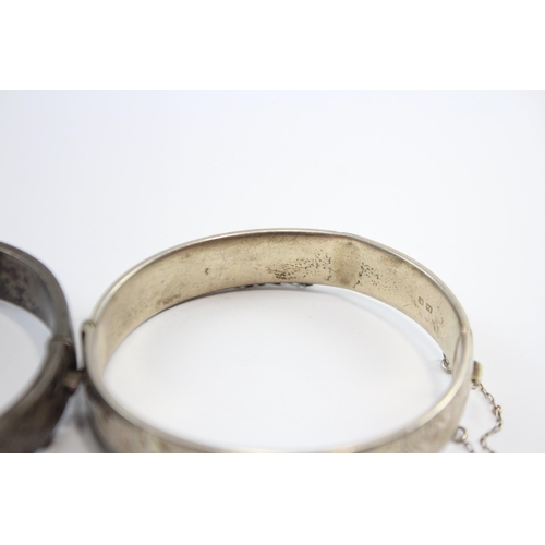 237 - A Collection Of Silver Bangles With Engraved Designs