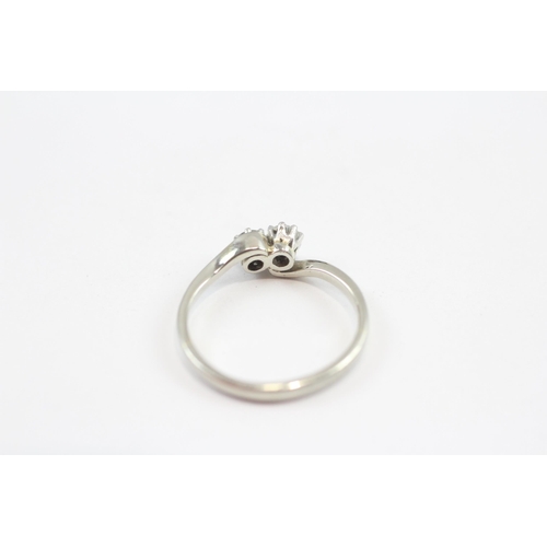 30 - 18ct White Gold Diamond Twin Stones Twist Setting Ring (2.2g) Size  M