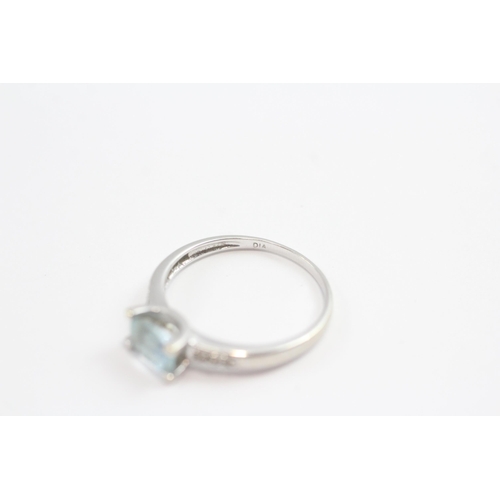 33 - 9ct White Gold Blue Topaz & Diamond Dress Ring (2.1g) Size  O