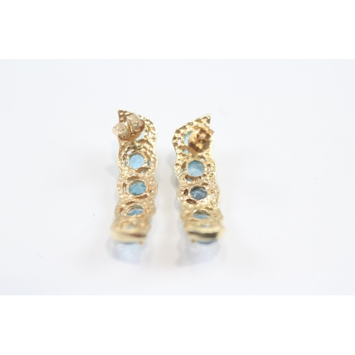 42 - 14ct Gold Blue Topaz Drop Earrings (4g)