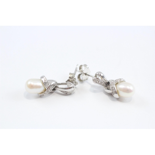 87 - 9ct White Gold Diamond And Cultured Pearl Set Drop Earrings (4.2g)