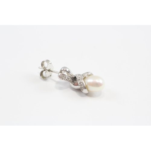 87 - 9ct White Gold Diamond And Cultured Pearl Set Drop Earrings (4.2g)