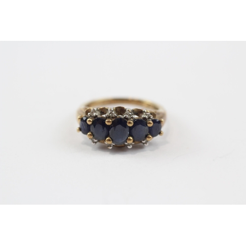 123 - 9ct Gold Sapphire Five Stone Ring With Diamond Accent (3g) Size  L