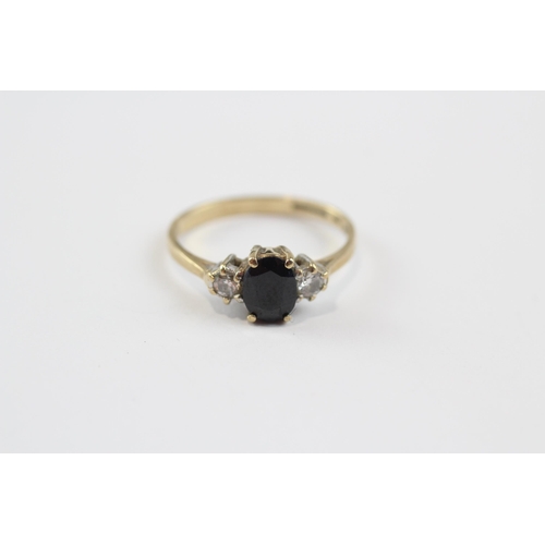 124 - 9ct Gold Diamond & Sapphire Three Stone Ring (1.7g) Size  L