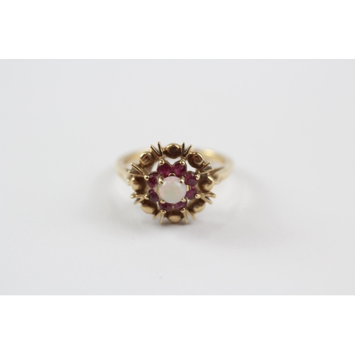 244 - 9ct Gold White Opal & Ruby Halo Ring (2.5g) Size  J