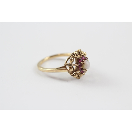 244 - 9ct Gold White Opal & Ruby Halo Ring (2.5g) Size  J