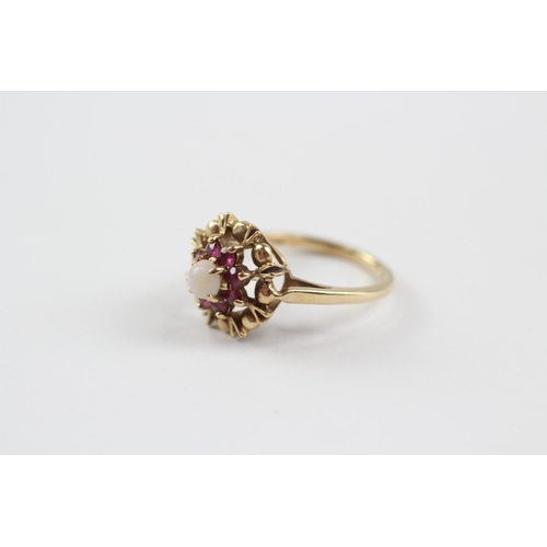 244 - 9ct Gold White Opal & Ruby Halo Ring (2.5g) Size  J