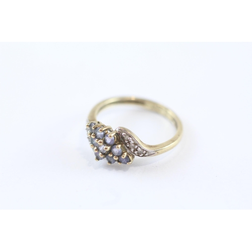 259 - 9ct Gold Diamond & Tanzanite Cluster Ring (1.6g) Size  J