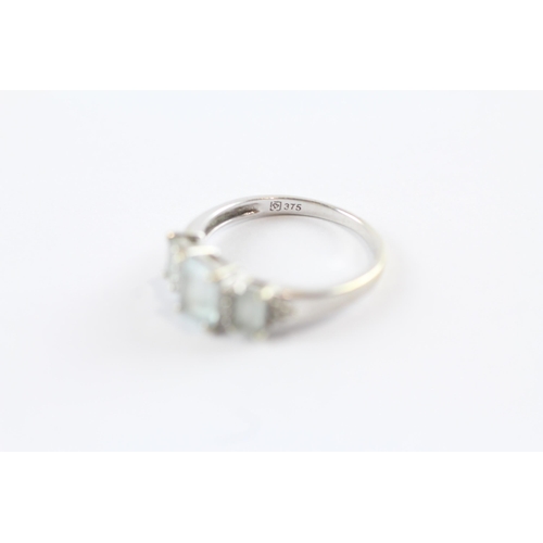 260 - 9ct Gold Aquamarine Three Stone Ring With Diamond Spacers (2.7G) Size  P