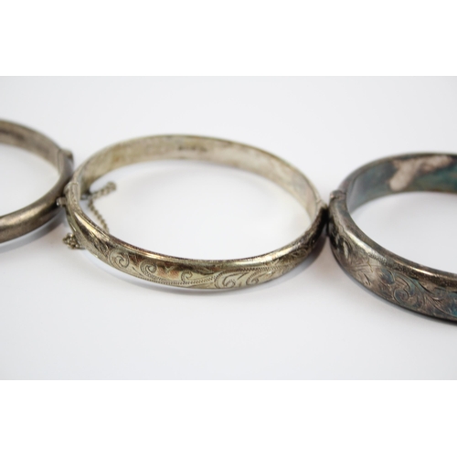 270 - Four Silver Etched Bangles Including Bamboo Effect (69g)