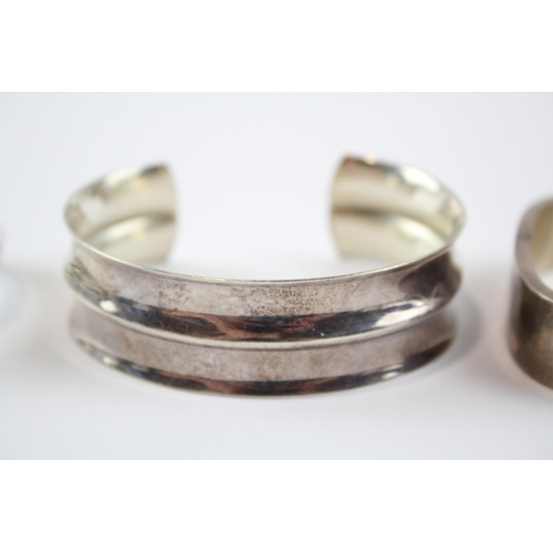 278 - Three Silver Modernist Bangles (72g)