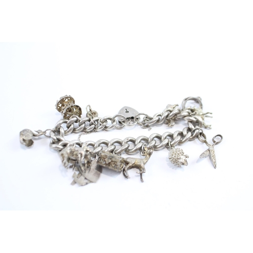 297 - Silver Charm Bracelet With Heart Padlock Clasp (74g)