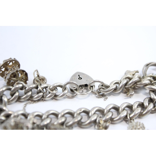 297 - Silver Charm Bracelet With Heart Padlock Clasp (74g)