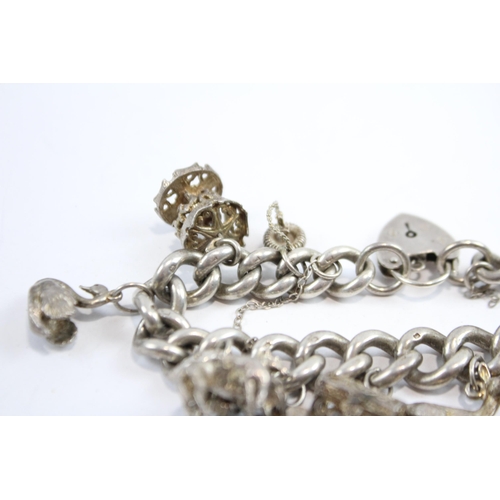 297 - Silver Charm Bracelet With Heart Padlock Clasp (74g)