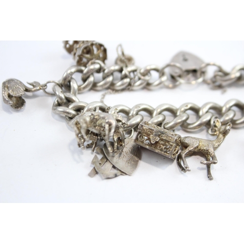 297 - Silver Charm Bracelet With Heart Padlock Clasp (74g)