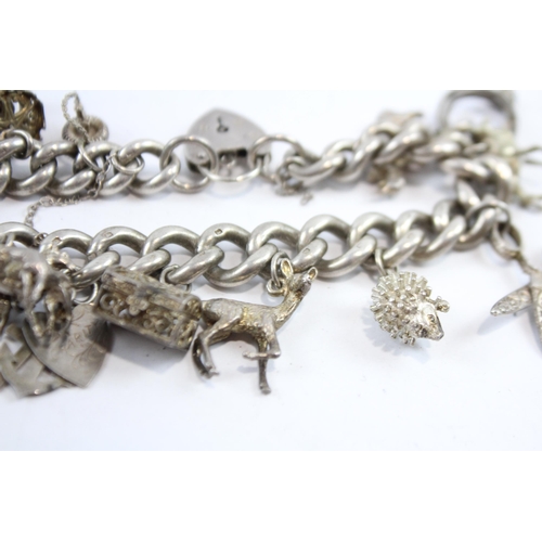 297 - Silver Charm Bracelet With Heart Padlock Clasp (74g)