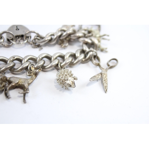 297 - Silver Charm Bracelet With Heart Padlock Clasp (74g)