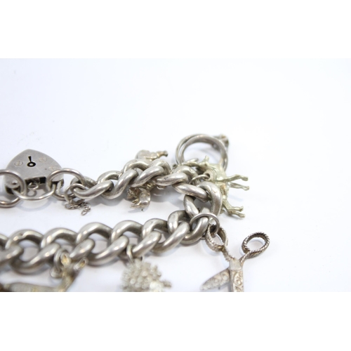 297 - Silver Charm Bracelet With Heart Padlock Clasp (74g)