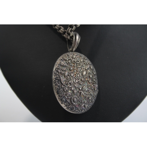 307 - Silver Antique Locket Necklace With Repousse Work (36g)