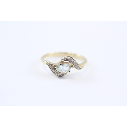 54 - 9ct Gold Diamond & Blue Topaz Dress Ring (2.1g) Size  N 1/2