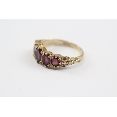 66 - 9ct Gold Garnet Five Stone Ring (4.3g) Size  R