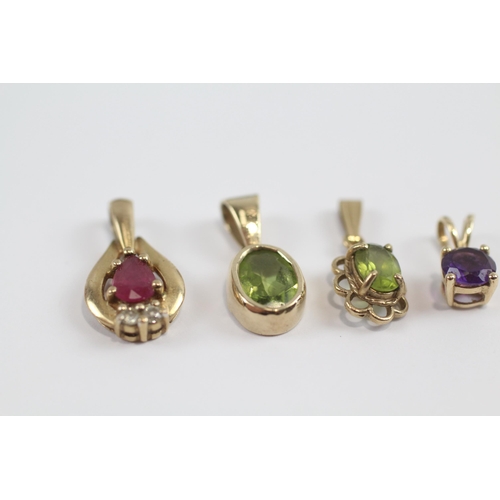 93 - 4 X 9ct Gold Gemstone Set Pendants Inc. Peridot, Amethyst, Ruby & Diamond (2.8g)