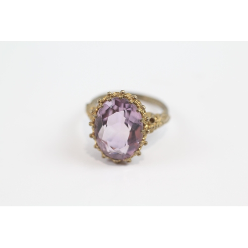 102 - 9ct Gold Vintage Amethyst Set Cocktail Ring (6.1g) Size  P