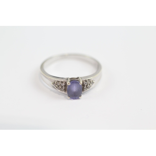 108 - 9ct White Gold Diamond Accented Tanzanite Set Dress Ring (3g) Size  Q