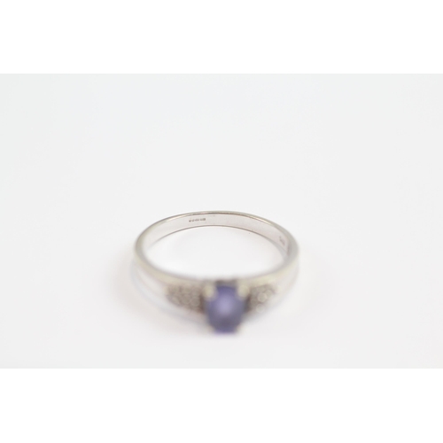 108 - 9ct White Gold Diamond Accented Tanzanite Set Dress Ring (3g) Size  Q