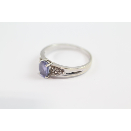 108 - 9ct White Gold Diamond Accented Tanzanite Set Dress Ring (3g) Size  Q