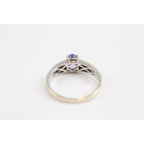 108 - 9ct White Gold Diamond Accented Tanzanite Set Dress Ring (3g) Size  Q