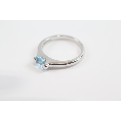 112 - 9ct White Gold Square Cut Topaz Set Solitaire Ring (2.9g) Size  O