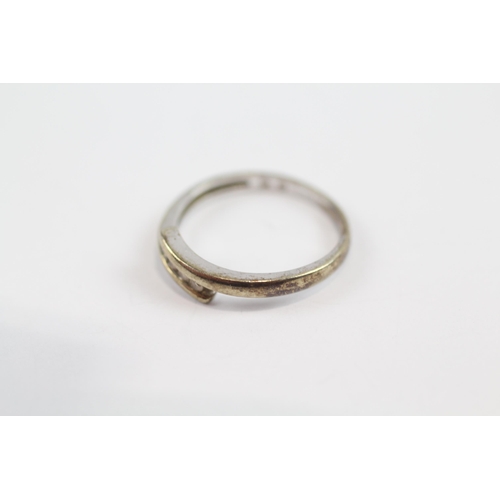 134 - 9ct Gold Diamond Four Stone Bypass Ring (1.5g) Size  L